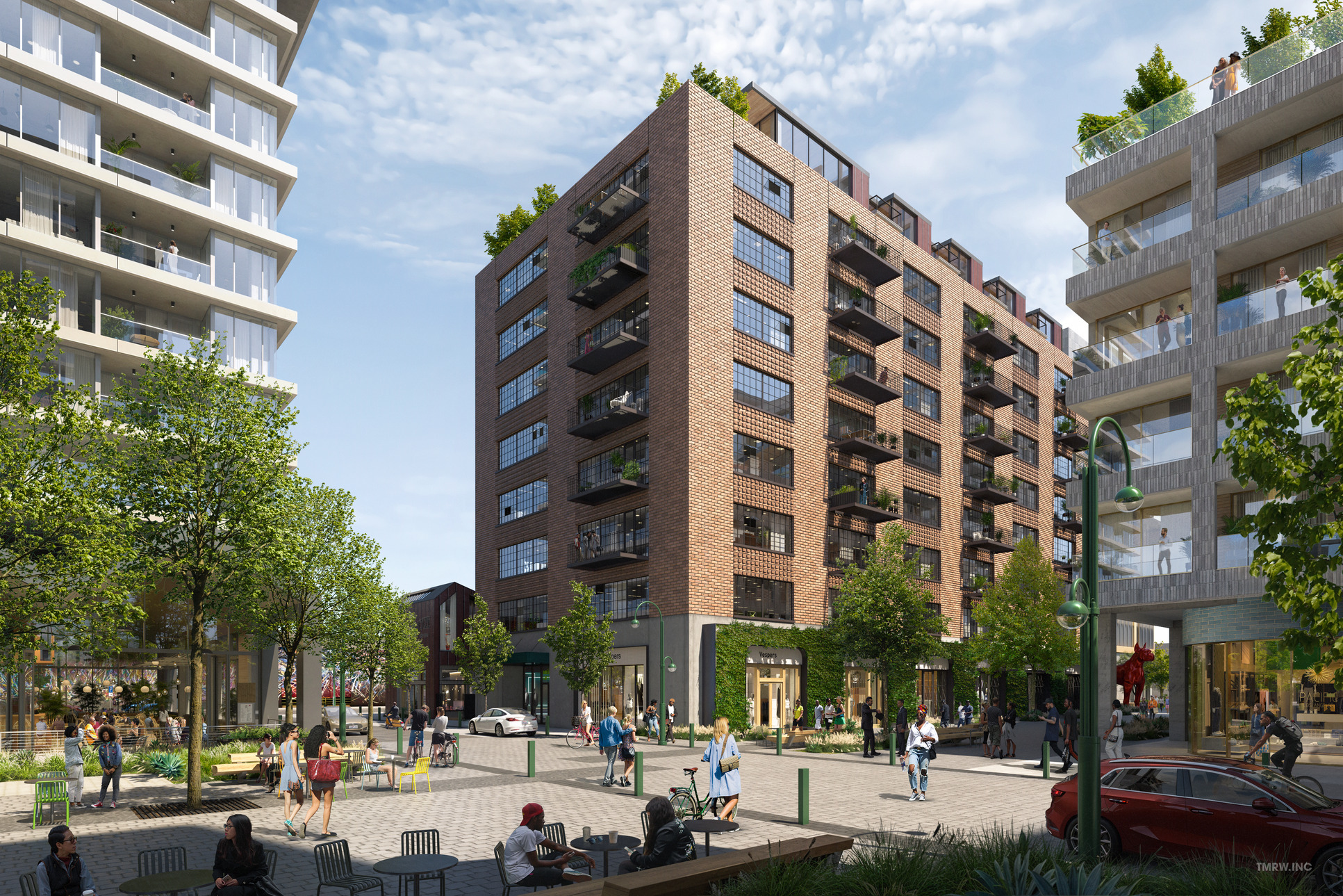 Modern brick apartment building with balconies in a lively urban plaza.